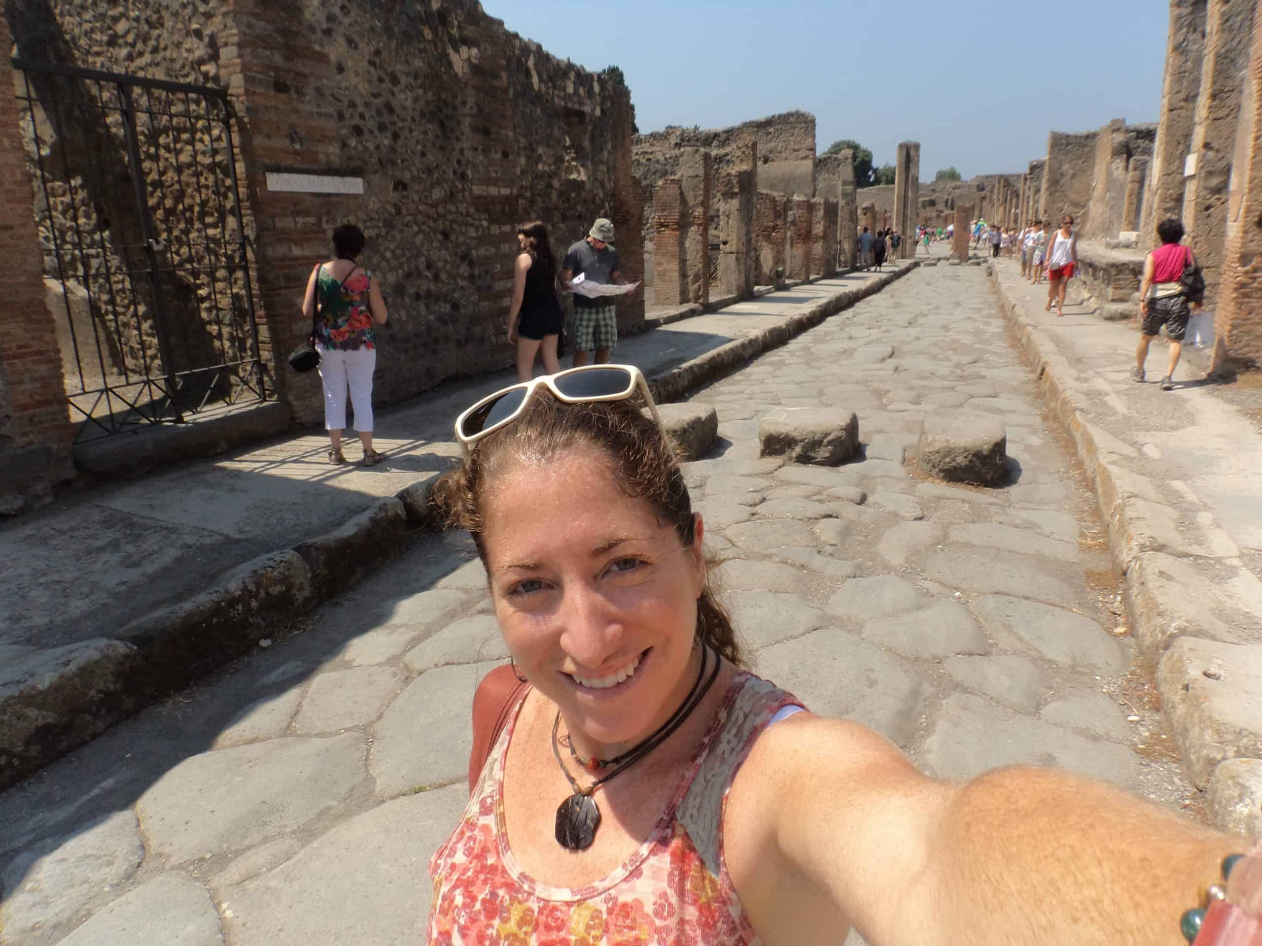 Taking a selfie while touring the streets of Pompeii
