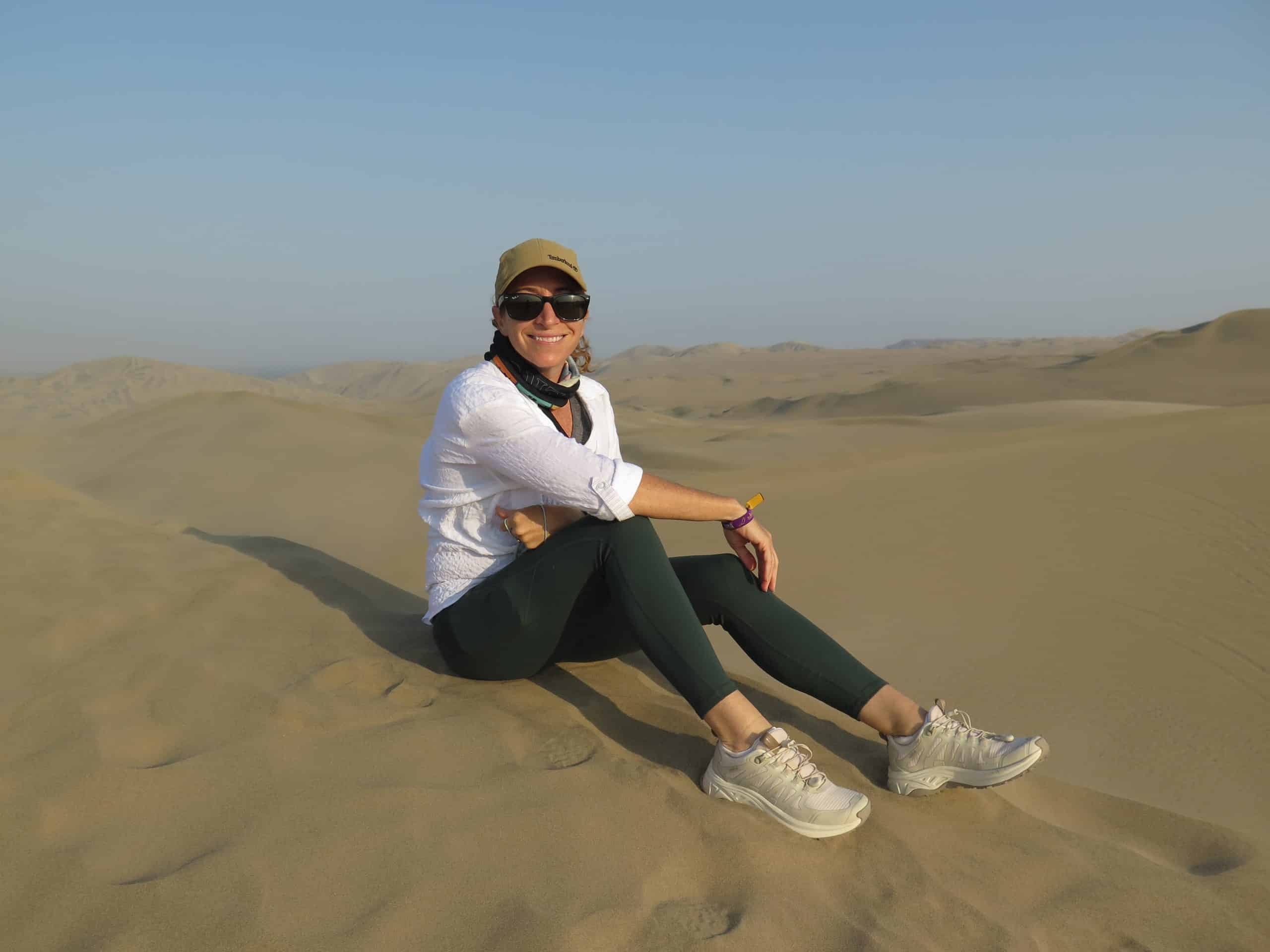Traveler sitting in the desert