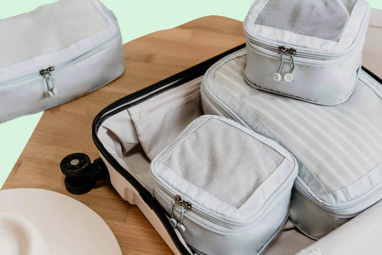A variety of packing cubes for packing light in one bag.