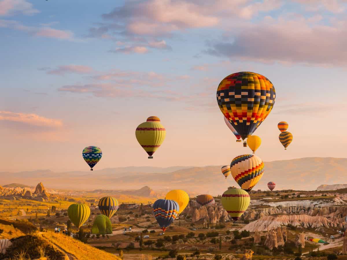 Hot air balloons rise over Cappadocia in Turkey.