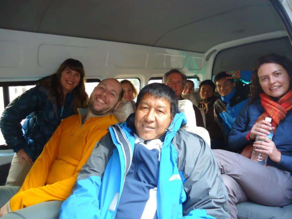 Trekkers load into a van to get to the trailhead for their Annapurna Circuit trek.