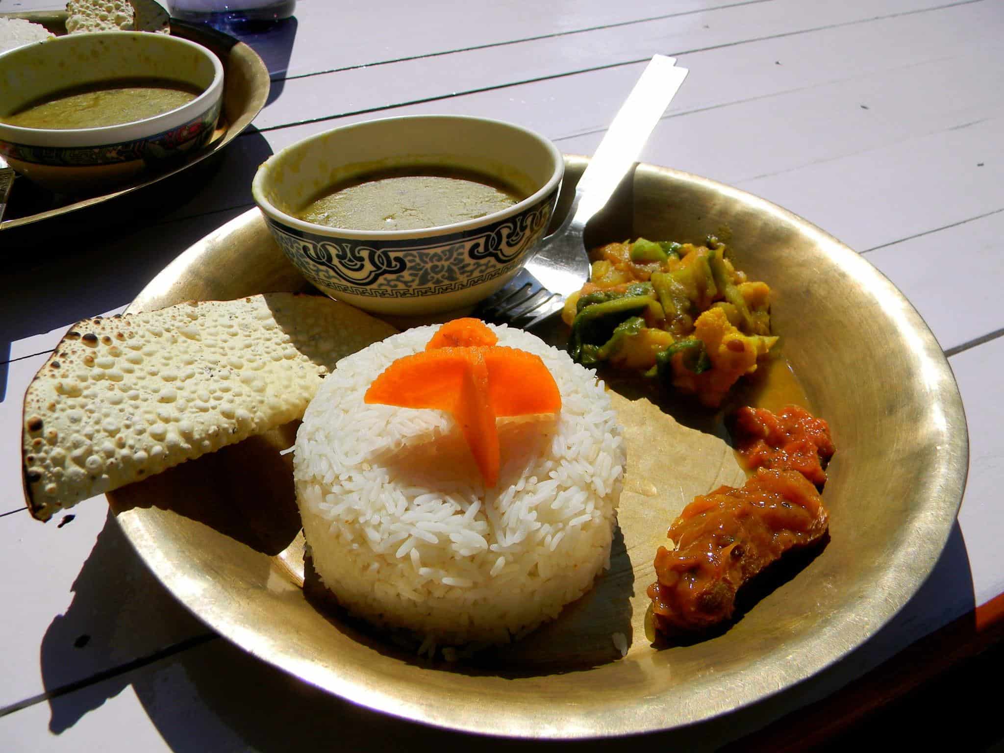 A plate of dal baht is served on the Annapurna Circuit trail.