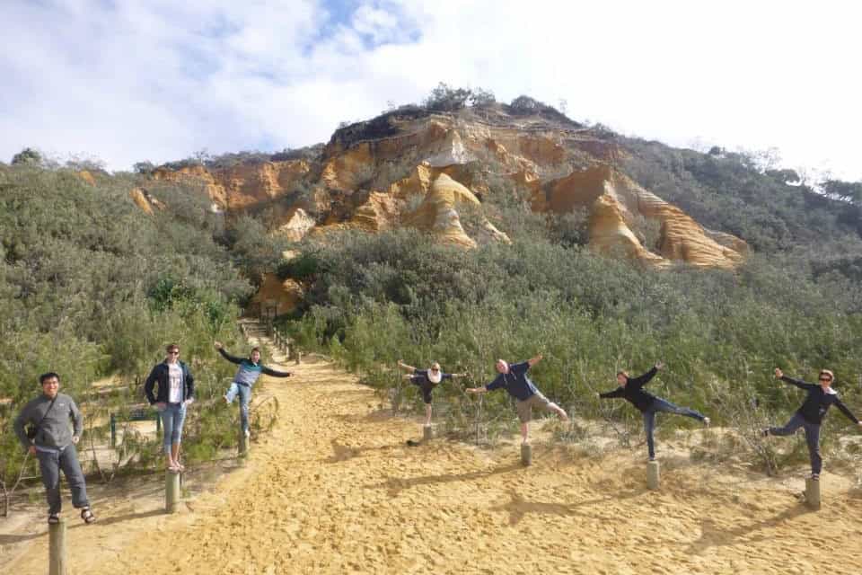 Travelers take a group photo on their 3-day tour of K'gari island.
