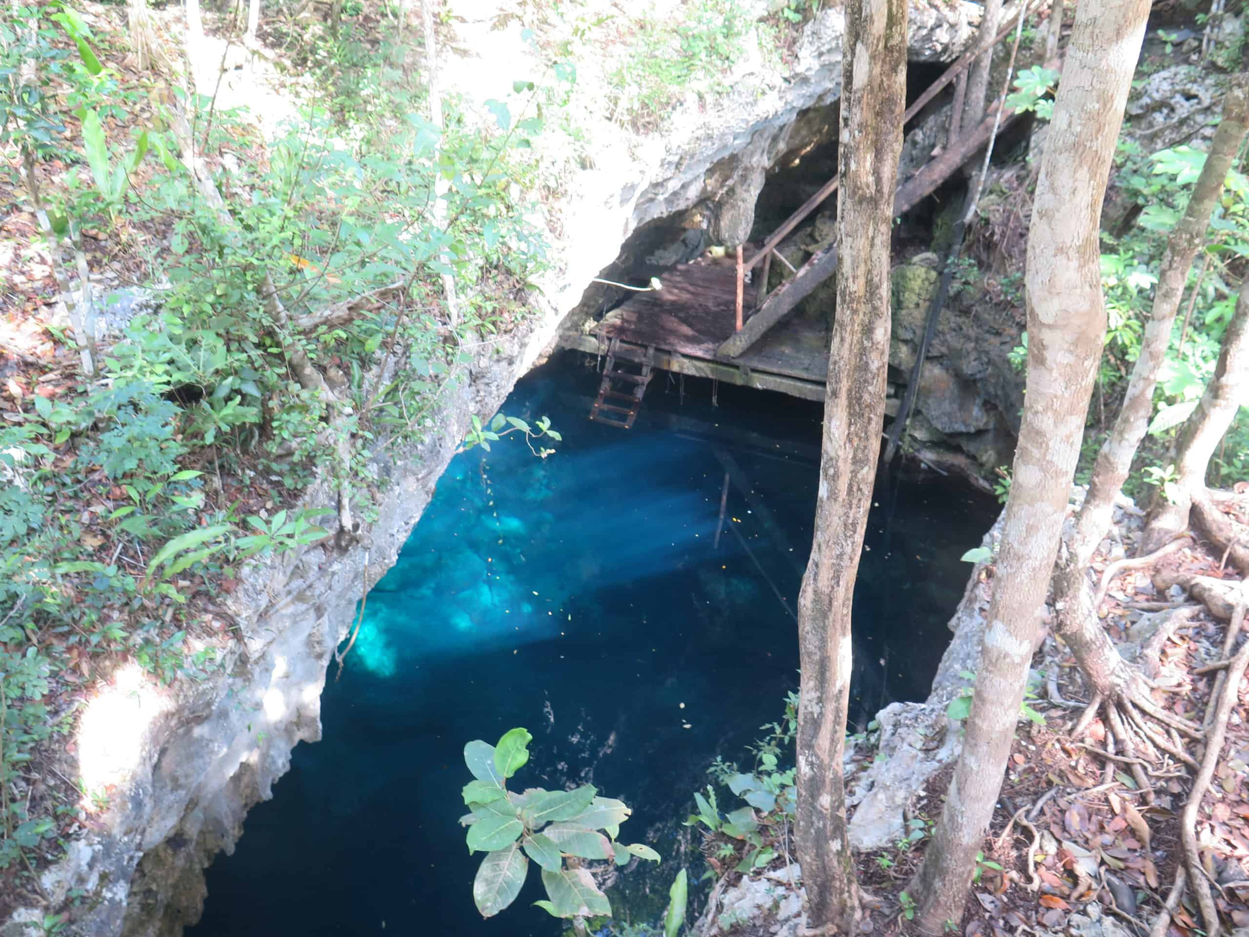 A cenote in Mexico called The Pit from the surface.