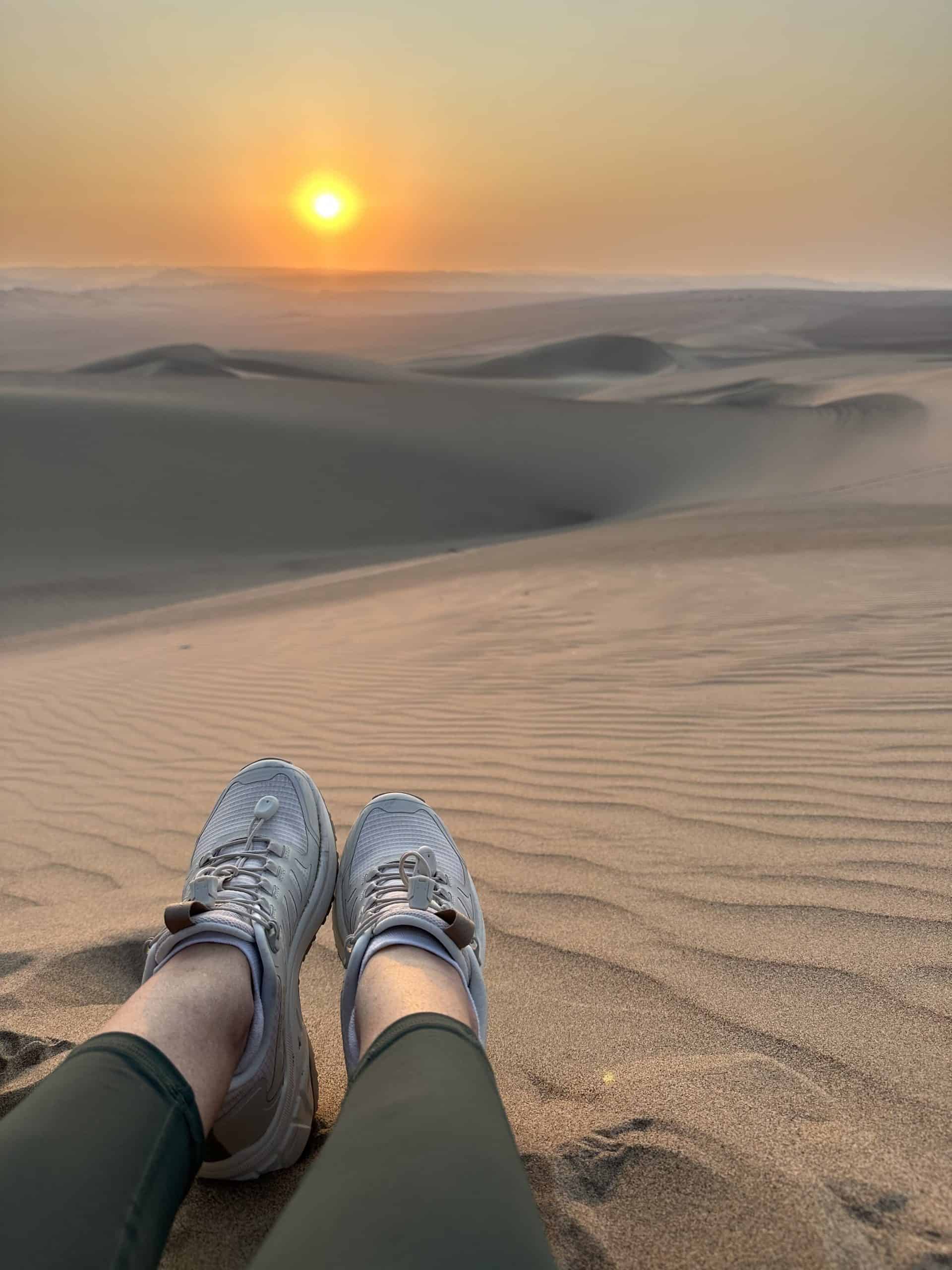 Sand in your shoes is worth seeing this stunning sunset on the Huacachina Oasis tour from Lima.