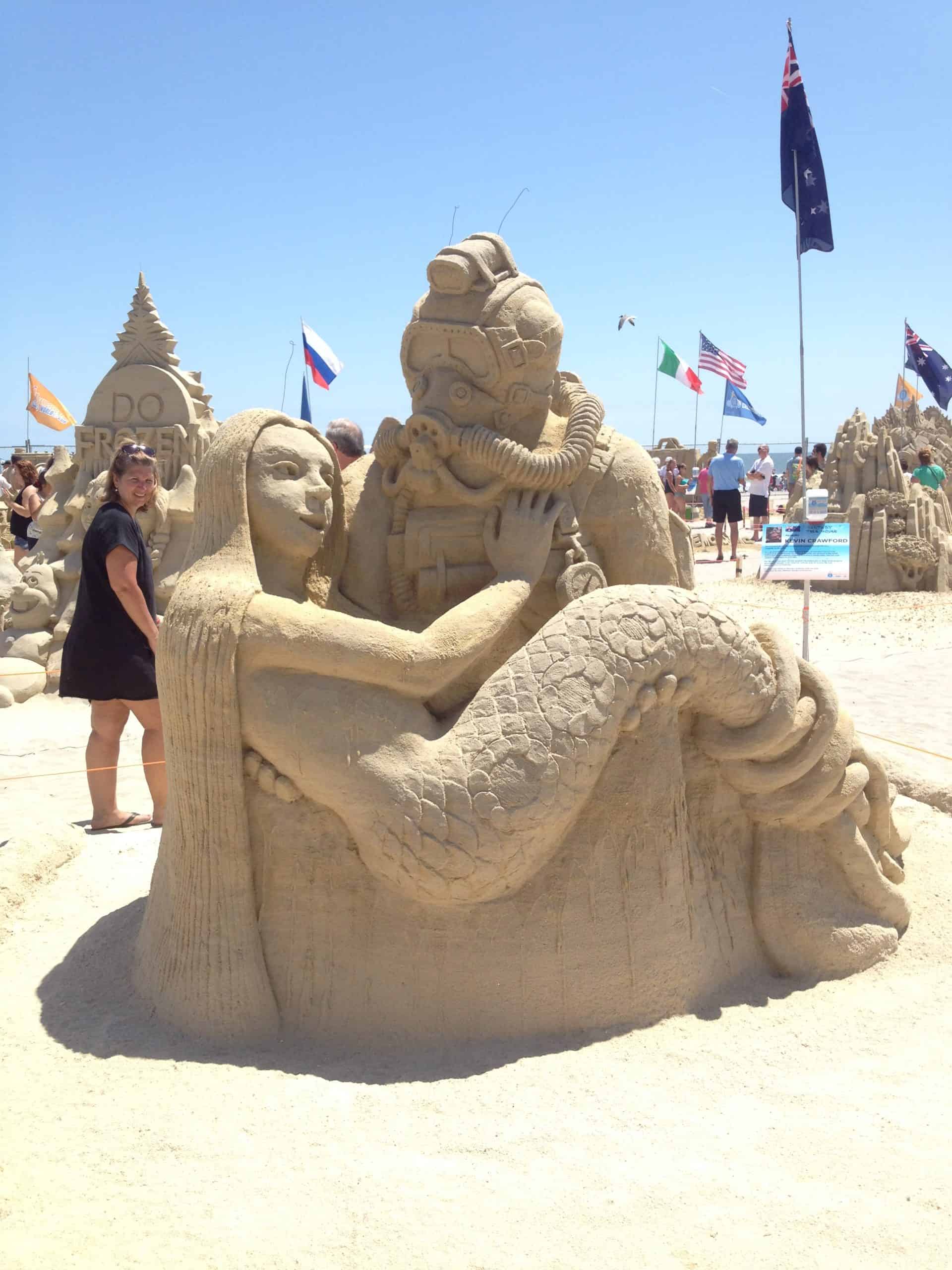 Someone builds a deep-sea diver cradling a mermaid for the sandcastle competition on the beach at Ocean City, NJ.