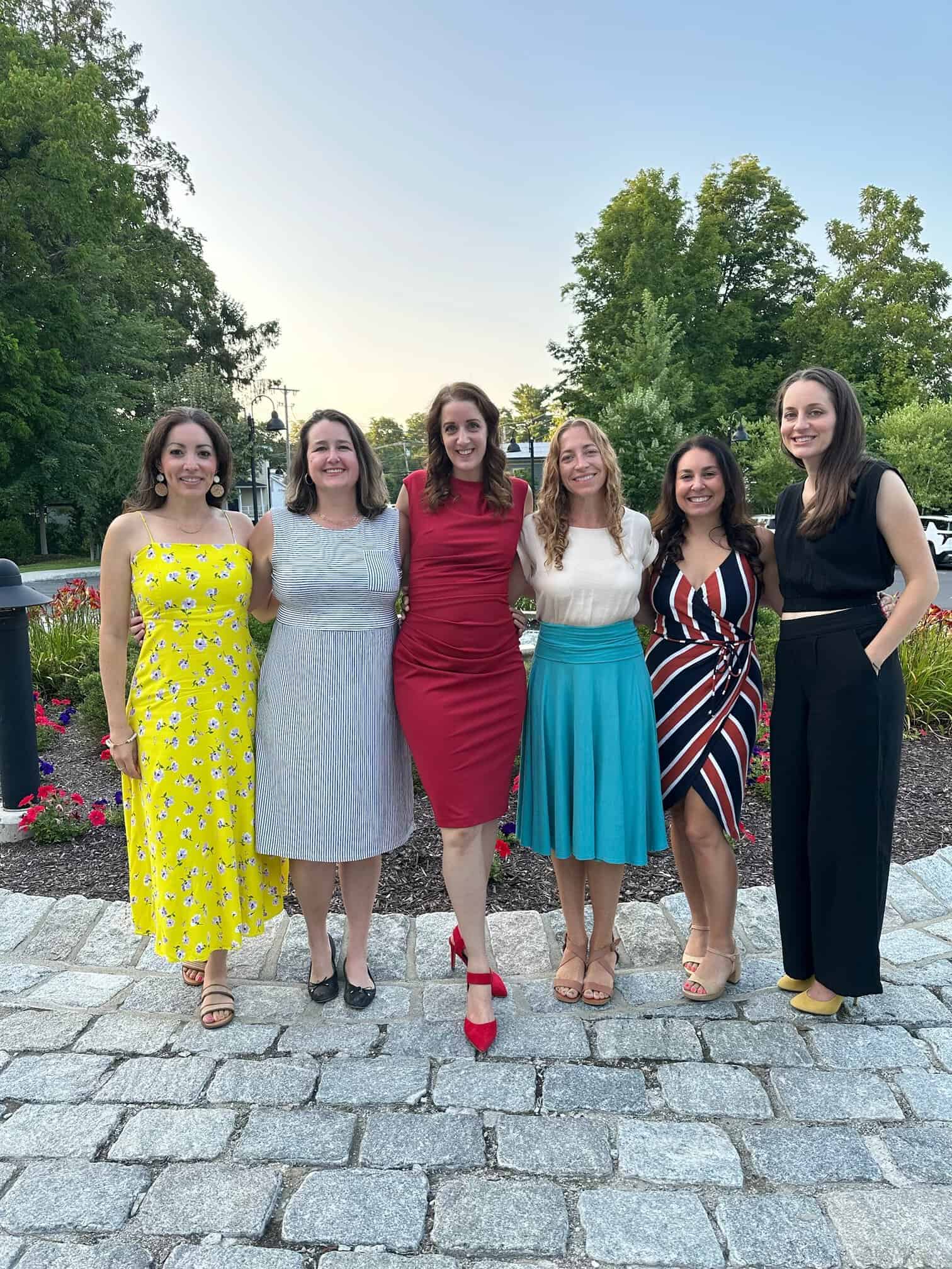 Six women pose in front of the fountain at Mirbeau Inn & Spa in Rhinebeck, NY.