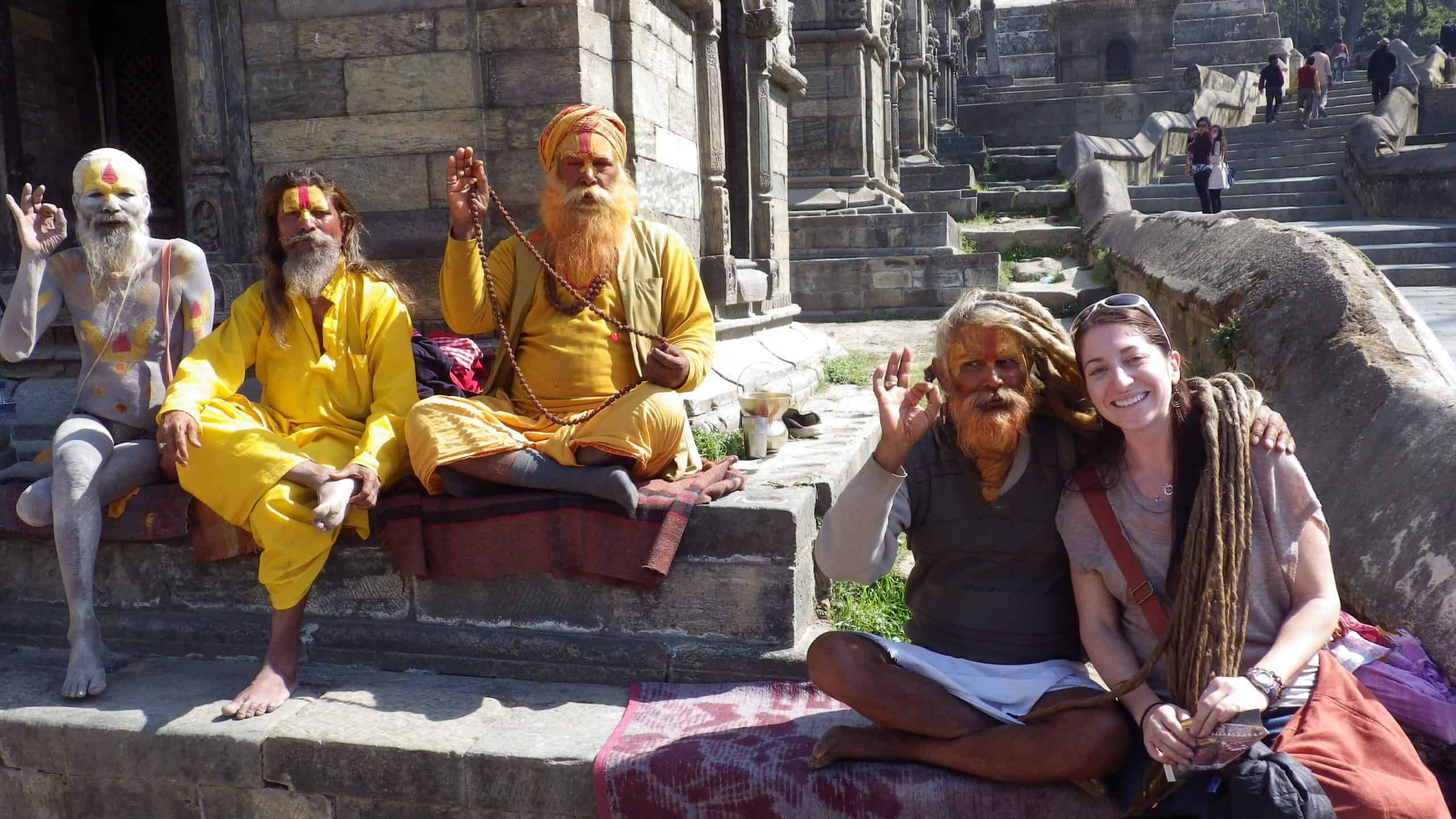Blogger poses with shamen at the Pashupatinath Temple in Kathmandu, Nepal.