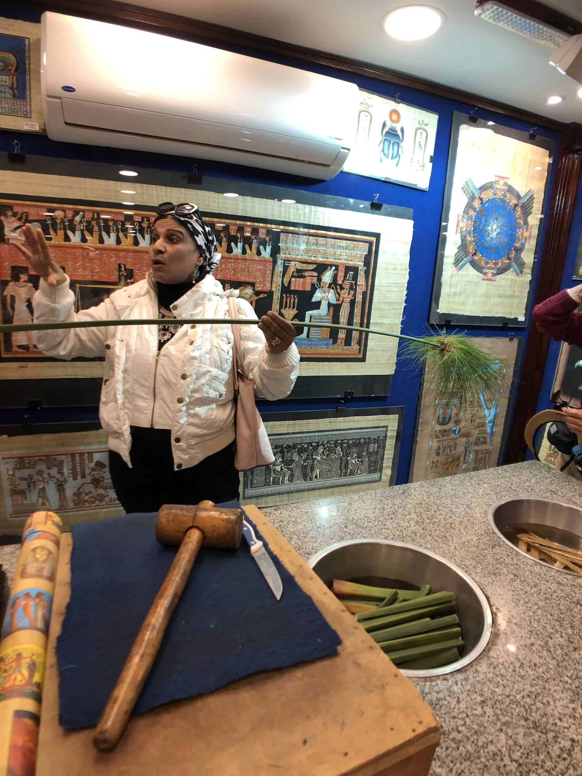 Egyptian woman explains the process of making papyrus.