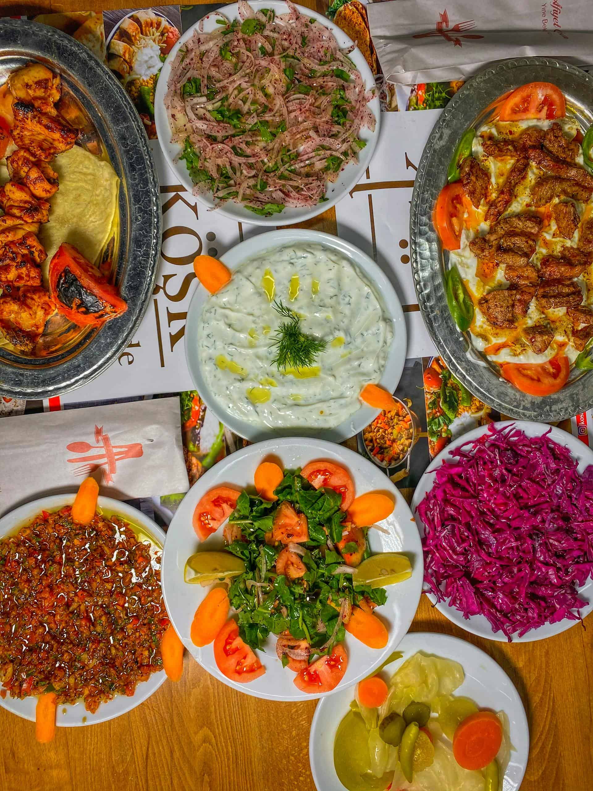 A vibrant top view of assorted Turkish meze dishes, capturing colorful salads and traditional flavors.