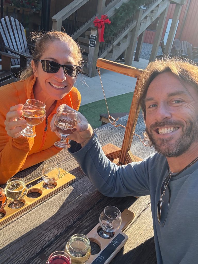 Sharing a toast with our cider flights at Reece's Cider Co in Ellijay, GA.